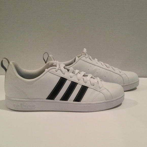 adidas white shoes with black stripes on one side